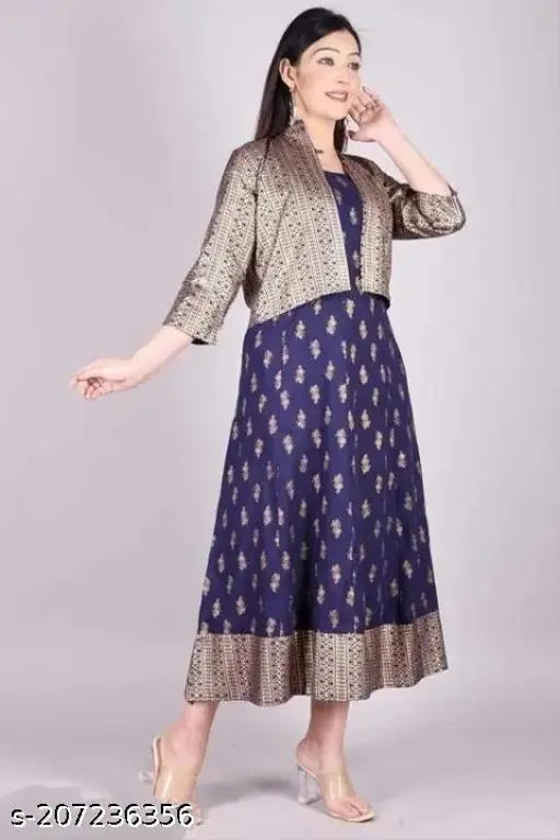 White Rayon Printed Jacleen Kurta Set, sleeveless nylon jacket included. Vibrant Indian design, available in M, L, XL, XXL sizes (Bust size: 38in for M). High-quality rayon fabric, made in India. Possible color variation due to screen resolution