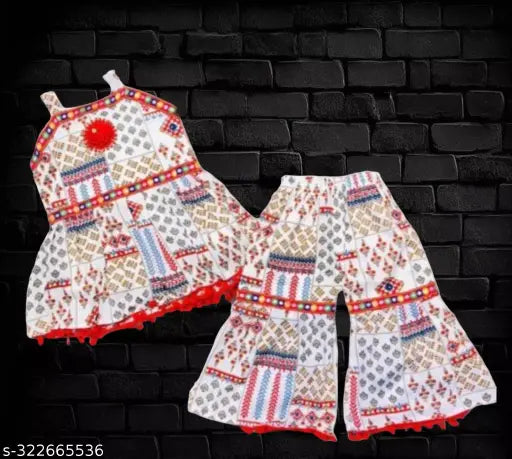 Embellished cotton blend sharara plazo dress for kids partywear (2-9 years), Indian traditional style on display