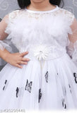 White net fit & flare party dress for girls, complete with hair band, fairy wings, and fairy stick. Embellished net design, three-quarter sleeves. Size range: 2-3 Years - 8-9 Years. Transform any celebration into a fairy-tale extravaganza