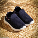 Vibrant color, lightweight synthetic Kats Kids walking shoes for boys and girls. Easy slip-on design for comfortable fit. Ideal for casual and party wear. Made in India