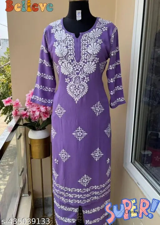 Rayon chikanakri kurta with pants, printed net fabric, three-quarter sleeves set on mannequin