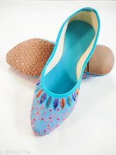Sky blue synthetic Mojaris with embellished pattern and closed back, comfortable fit for Indian sizes 4-9