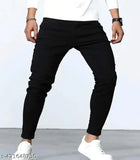 Black denim solid-pattern jeans made from premium cotton stretch fabric, machine washable in similar colors. Mid-rise, full length, clean washed, black jeans for boys with adjustable waist. Ideal for casual or everyday wear