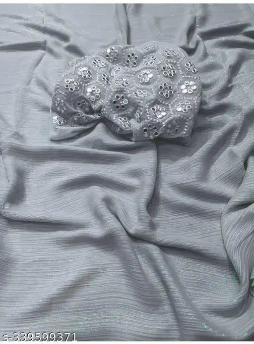 Shimmer grey Georgette saree with striped, embroidered net blouse, Indian traditional wear on model