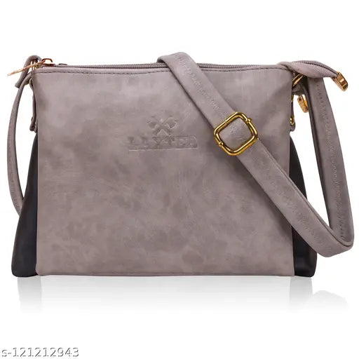 Grey sling bag with 3 compartments, self-design pattern. Quality fabric, free size (10in L x 2in W x 7in H). Classy, subtle, and spacious design from India