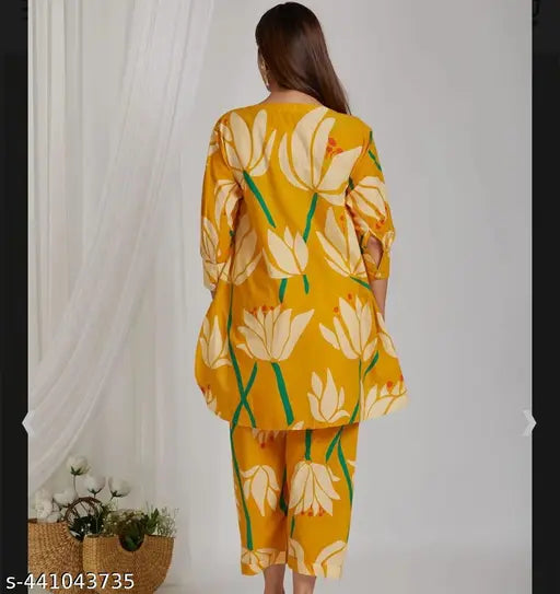 Yellow loose fit co-ord set, printed two piece set with matching top and bottom, cotton fabric. Summer-friendly, long sleeves, size M, L, XL, XXL, 4XL. Elegant and breezy women's cordsets for warm weather