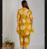 Yellow loose fit co-ord set, printed two piece set with matching top and bottom, cotton fabric. Summer-friendly, long sleeves, size M, L, XL, XXL, 4XL. Elegant and breezy women's cordsets for warm weather