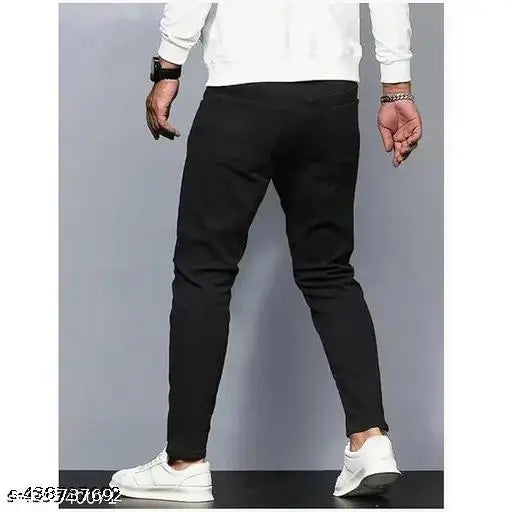 Black stretchable slim fit denim jeans for men, made from solid cotton blend denim. Perfect for casual wear and versatile style upgrade