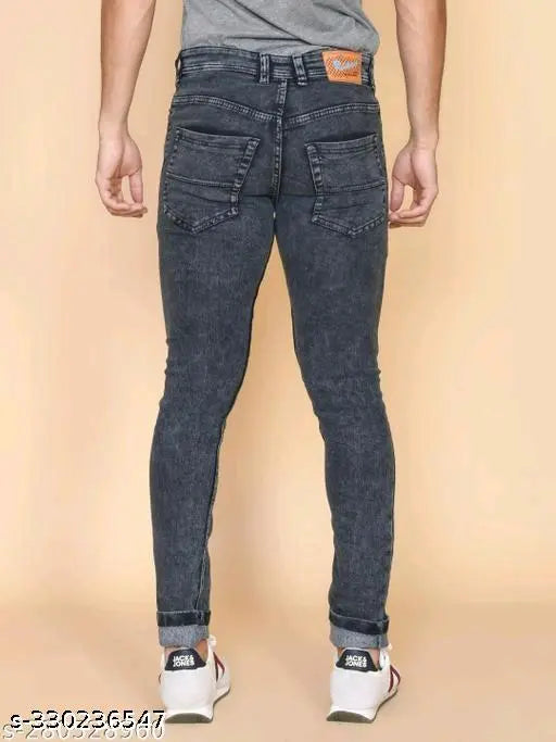 Men's grey slim-fit cotton blend jeans, dyed/washed solid style. Trendy men's denim jeans displayed on a hanger, sizes available: 30, 32, 34, 36 (IN) & 24, 26 (IN)