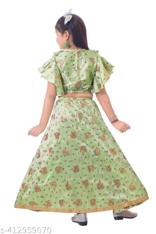 Printed art silk lehenga choli set for girls, applique net pattern on display