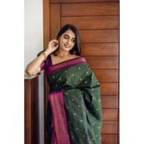 Dark green litchi silk printed saree with unstitched blouse - casual Indian women's wear on mannequin