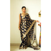Black litchi silk printed saree with unstitched blouse, casual occasion wear on mannequin