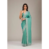 Light green silk embroidered saree with unstitched blouse (5.5mtr), traditional Indian wear on display