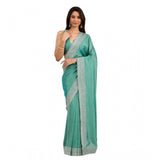 Light green silk embroidered saree with unstitched blouse, intricate patterns showcased on a model