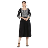 Black rayon printed kurti with 3/4th sleeves on a fashion mannequin