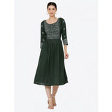 Green printed rayon women's casual kurti with 3/4th sleeves on model