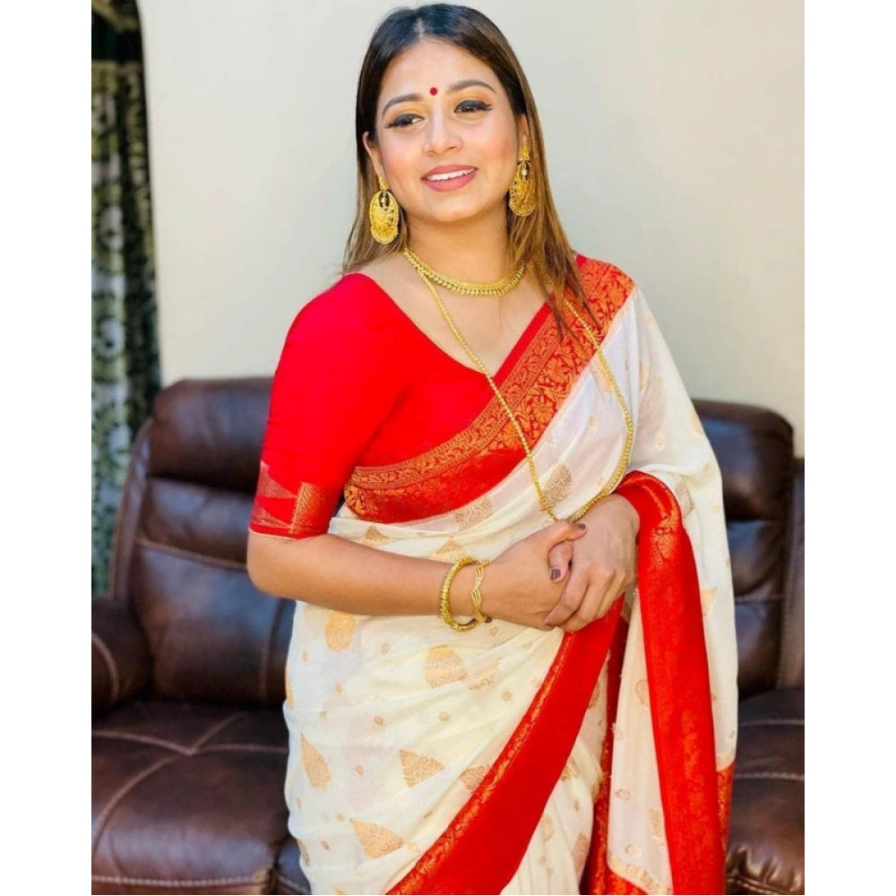 White soft lichi silk printed saree with unstitched blouse, luxurious eastern wear for women on display