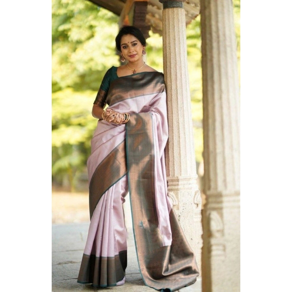 Light-pink soft lichi silk printed saree with unstitched blouse, traditional Indian women's wear on display