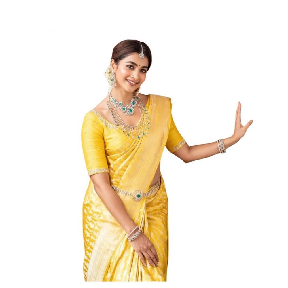 Yellow soft lichi silk printed saree with unstitched blouse, vibrant eastern fashion on mannequin