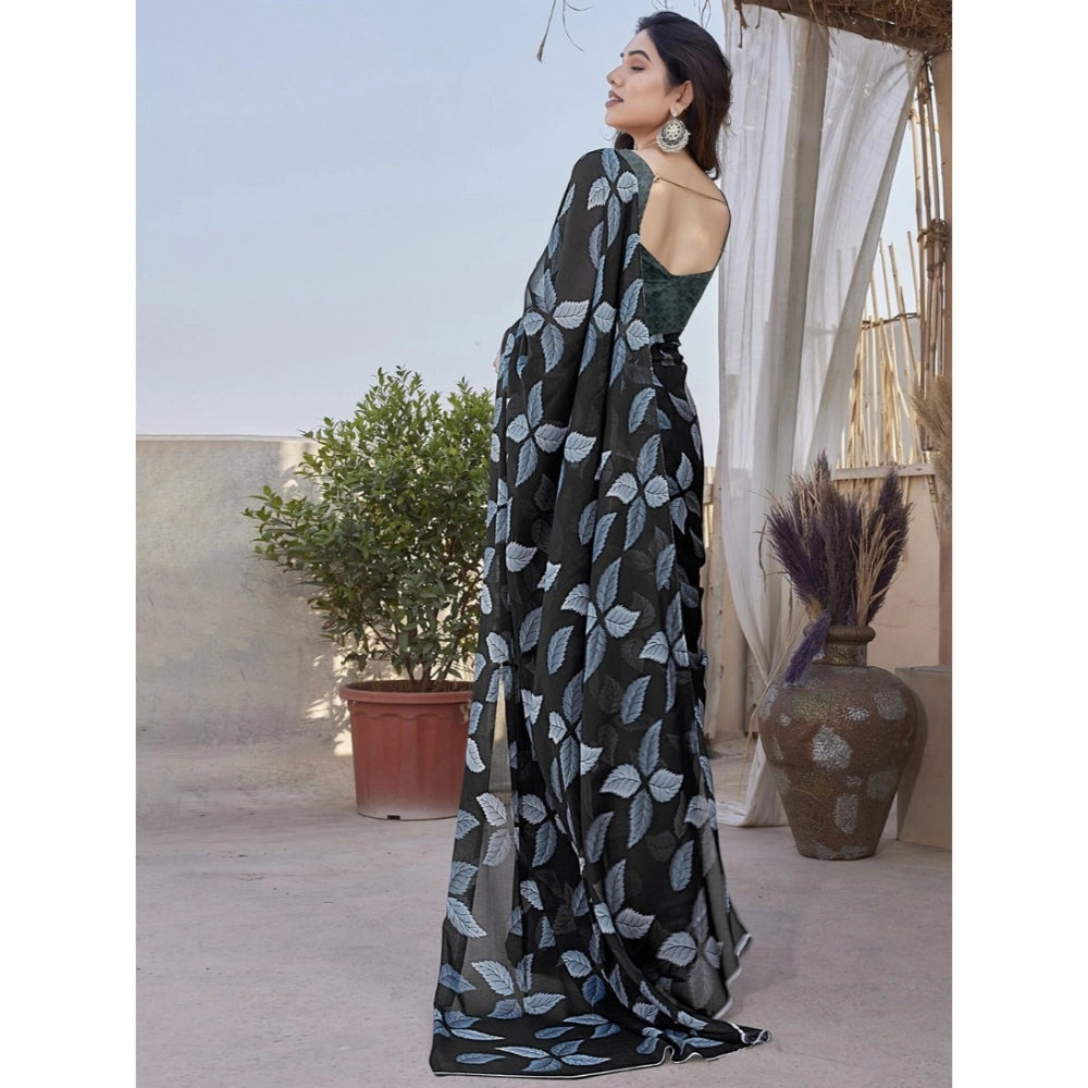 Black chiffon printed saree with unstitched blouse (5.5mtr) on mannequin
