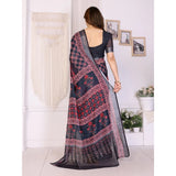 Black linen cotton printed saree with unstitched blouse, vibrant patterns for traditional Indian wear