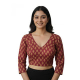 Maroon Ajrakh Cotton Printed Halter Neck Padded Blouse with long sleeves on mannequin, self-alterable size 36-40