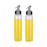 Multi-colored plastic oil bottles with airtight dispensers, ideal for kitchen essentials