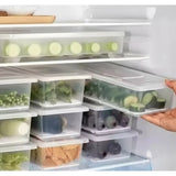 Multi-colored plastic food container set with dividers, large serving tray for fridge organization