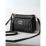 Black PU leather zipper sling bag for women - medium size accessory with functional closure