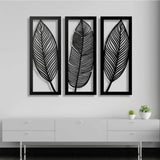 Black wooden leaf wall art panel frame set, ideal for home decor in living room, bedroom, dining room, and office