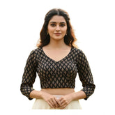 Black Ajrakh cotton halter neck padded blouse with long sleeves, front halter neck style on mannequin