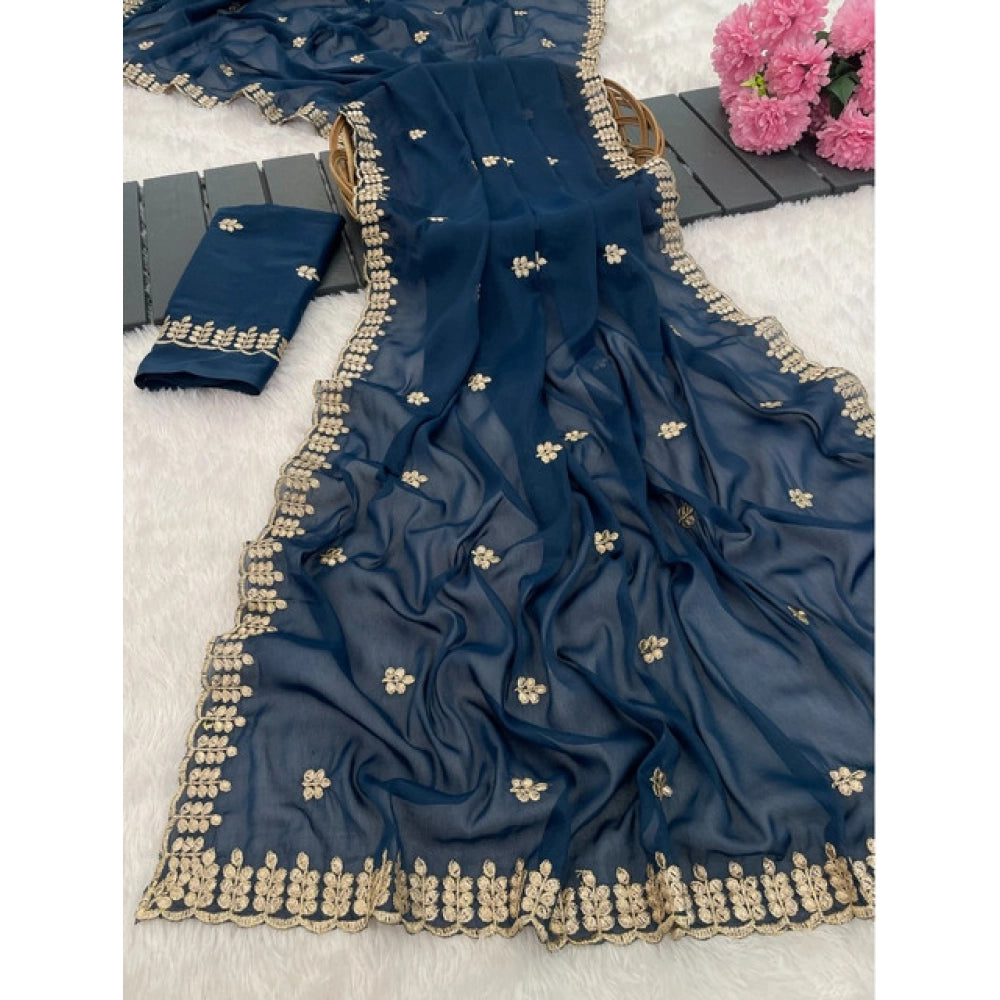Blue georgette embroidered saree with unstitched blouse, 5.5mtr length on model