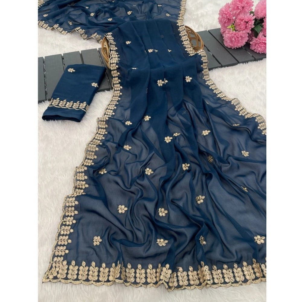 Blue Georgette embroidered saree with unstitched blouse, intricate pattern detail on display