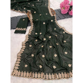 Green Georgette embroidered saree with unstitched blouse, intricate design on display