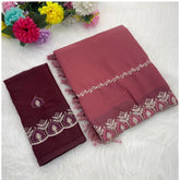 Red georgette embroidered saree with unstitched blouse (5.5mtr) on mannequin