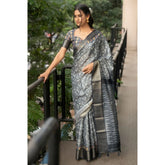 Grey polyester printed saree with unstitched blouse (5.5 mtr)