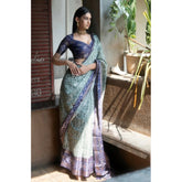 Green polyester printed saree with unstitched blouse, vibrant Indian fashion accessory