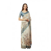 Cream polyester printed saree with unstitched blouse (5.5 mtr) - traditional Indian women's attire on display