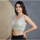 White silk blend embroidered V-neck blouse (alterable up to size 42) on hanger