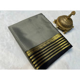 Gray crepe chit pallu solid saree with unstitched blouse, 5.5mtr length on display