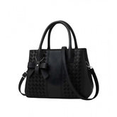 Black PU leather solid shoulder zipper handbag with 2 compartments, polyester lining, adjustable strap, and dual handle