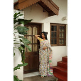 Multicolor linen printed saree with unstitched blouse (5.5Mtr), vibrant traditional wear on hanger