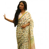 White linen printed saree with unstitched blouse, vibrant floral design for traditional Indian wear