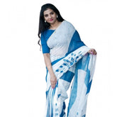 White linen printed saree with unstitched blouse, 5.5mtr length on model