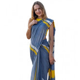 Blue linen printed saree with unstitched blouse, vibrant design on display