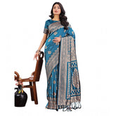 Teal silk printed saree with unstitched blouse, vibrant pattern for women's traditional Indian wear