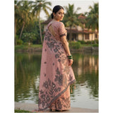 Peach linen-cotton printed saree with unstitched blouse, vibrant floral pattern for traditional Indian wear