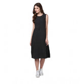 Black denim sleeveless dress with round neck and button closure, solid pattern