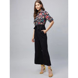 Multicolor floral print polyester women's short sleeve jumpsuit with shirt collar neck and ankle length bottom, displayed on a mannequin
