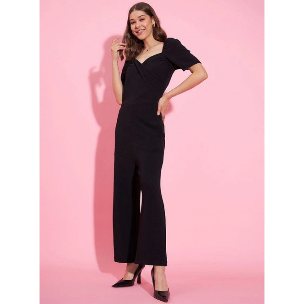 Black polyester lycra puff sleeve jumpsuit with sweatheart neck, ankle length, zip closure